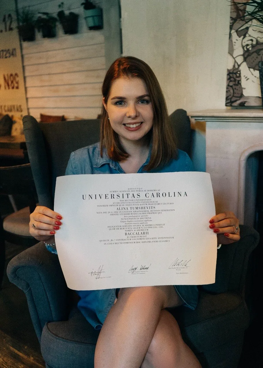 Alina with her Charles University diploma